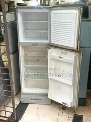Red 14 Cubic Feet Walton Refrigerator for sale.