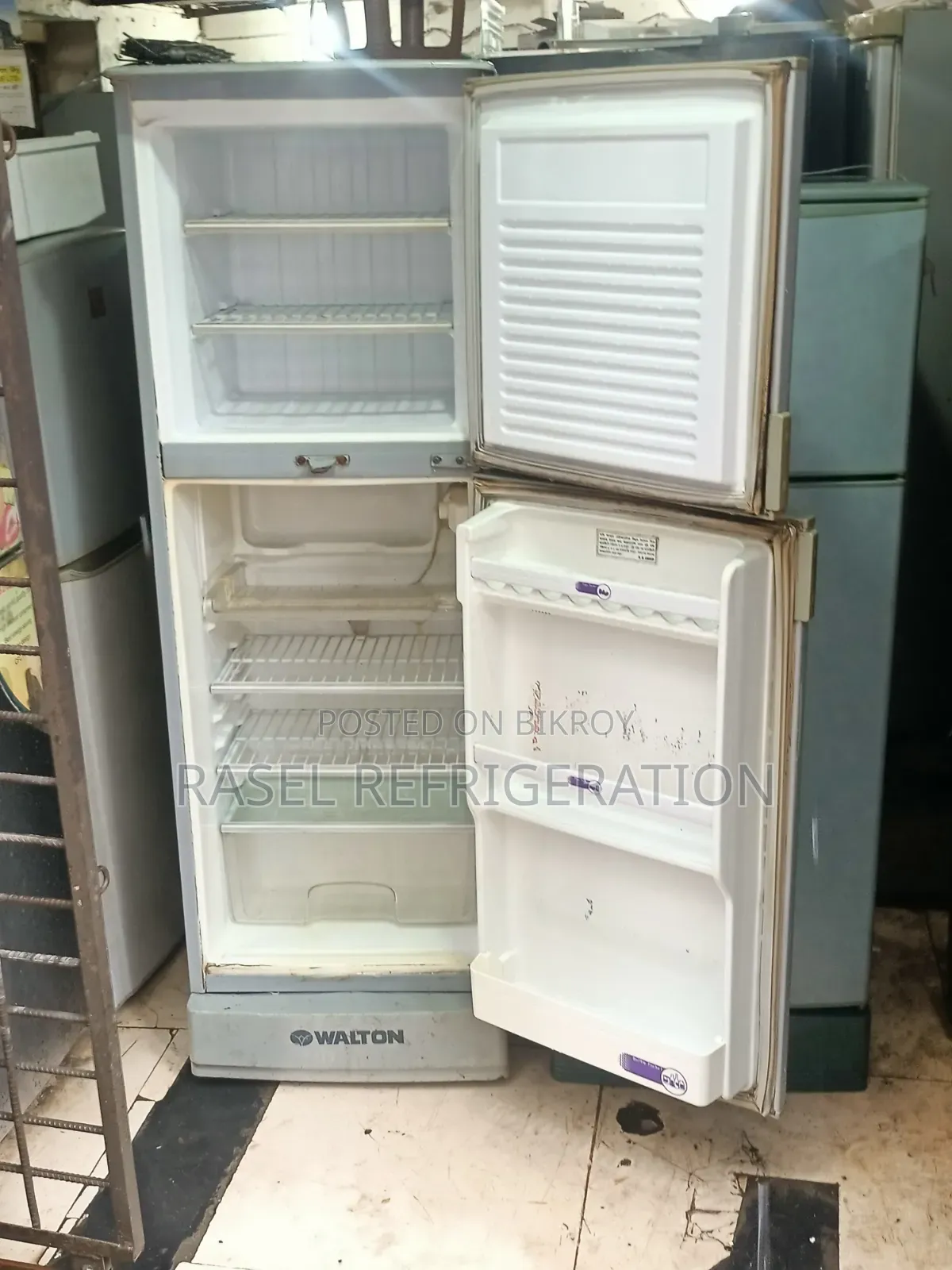 Red 14 Cubic Feet Walton Refrigerator for sale.