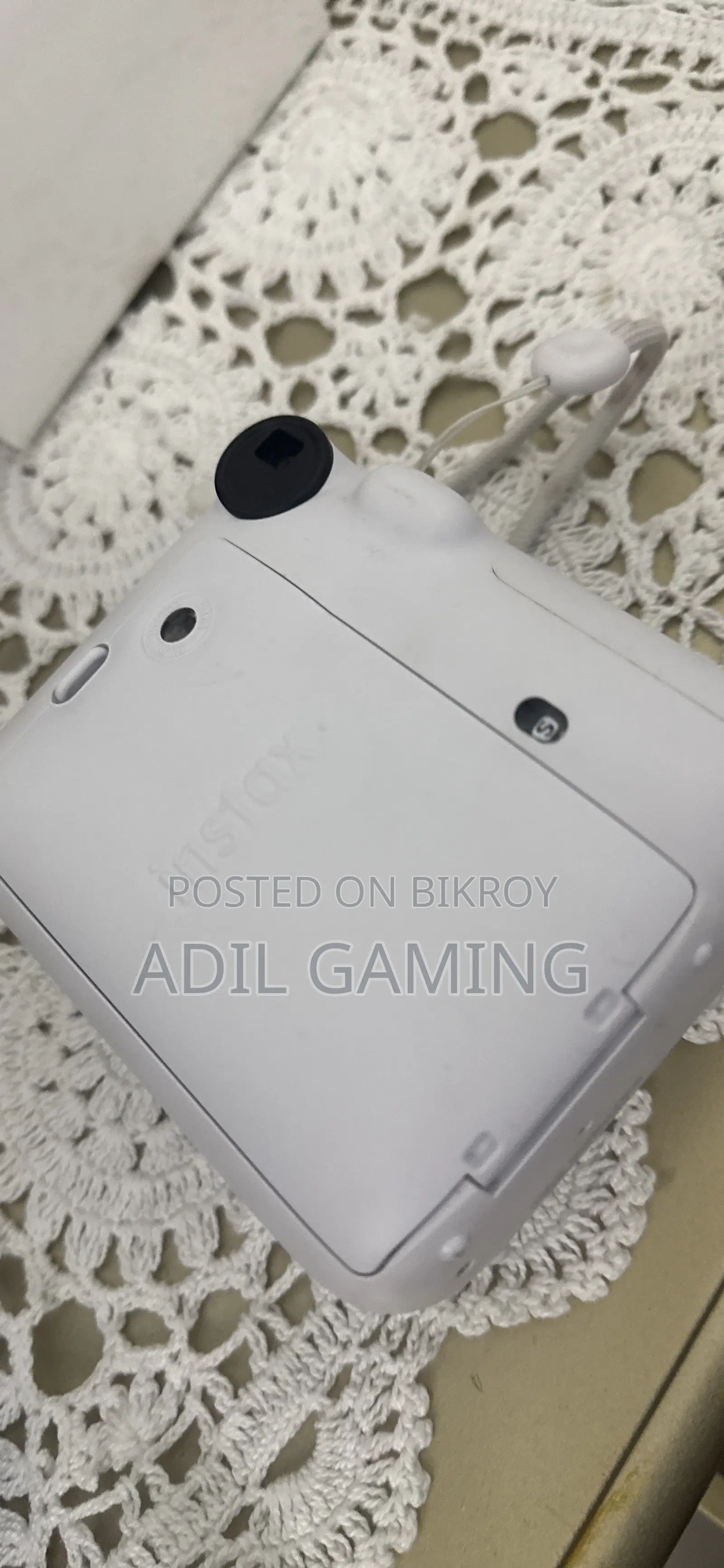 সিঙ্গাপুর থেকে আনা ফুজি ফিল্ম ইনস্ট্যাক্স মিনি ১২