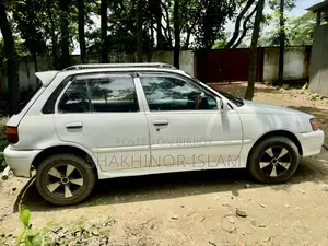 টয়োটা স্টারলেট গ্লানজা ১৯৯৫ সাদা