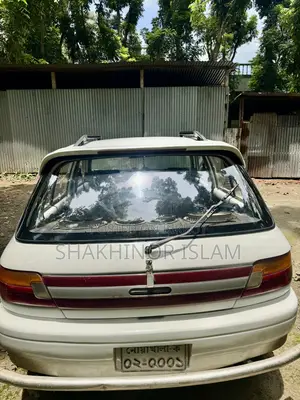 টয়োটা স্টারলেট গ্লানজা ১৯৯৫ সাদা