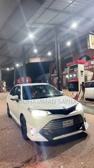 টয়োটা অ্যাক্সিও ২০১৬ সাদা