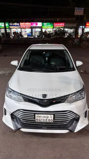 টয়োটা অ্যাক্সিও ২০১৬ সাদা