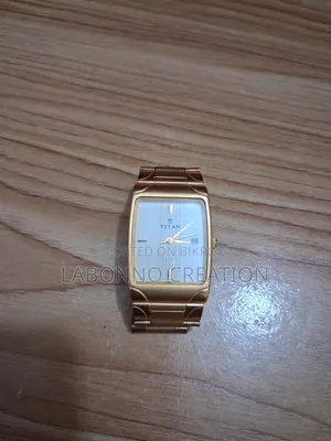 Titan Watch 1937YDC Gold