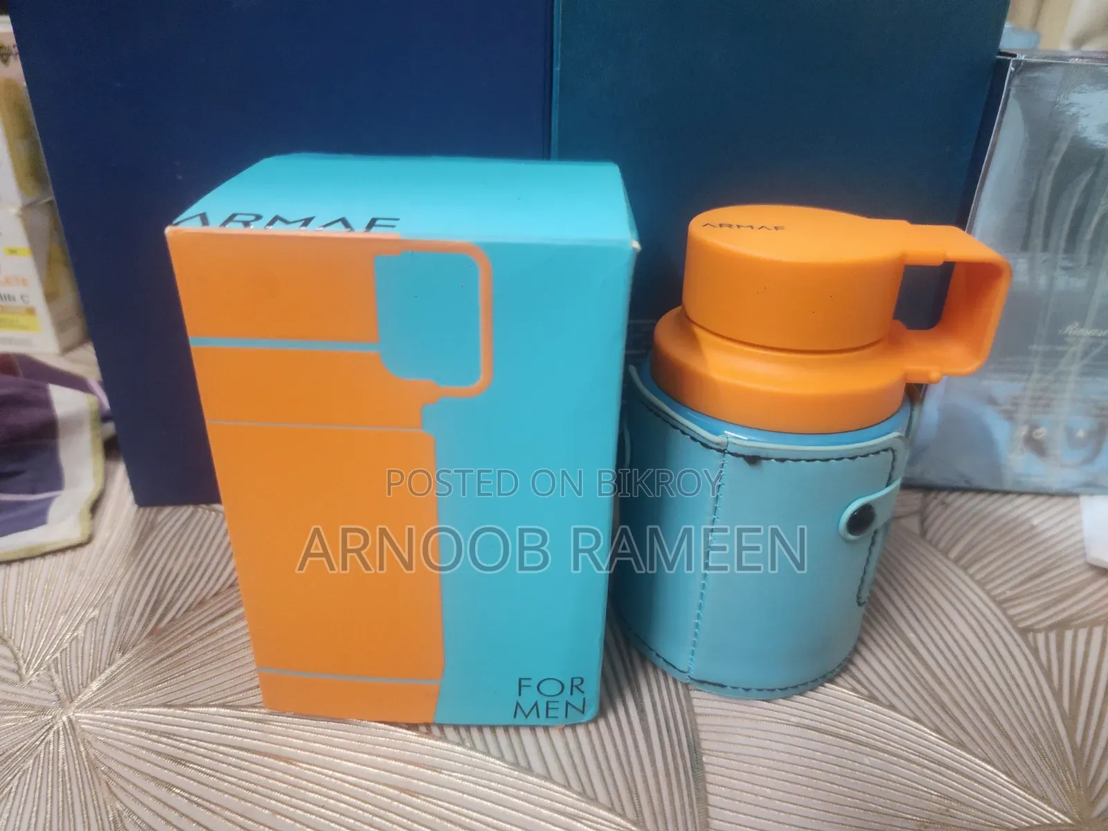 Odyssey Mandarin Sky Armaf With Box Ju*ice Is Shown
