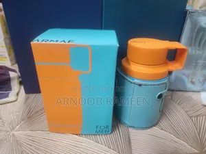 Odyssey Mandarin Sky Armaf With Box Ju*ice Is Shown