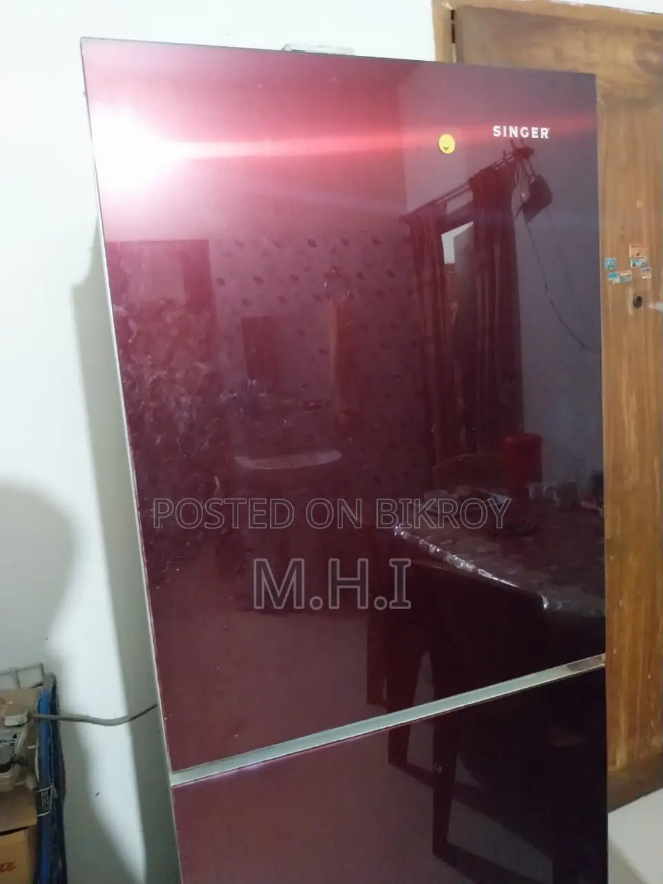 Singer brand 190-liter fridge for sale.