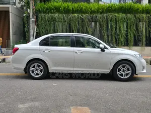 টয়োটা এক্সিও ১.৩ এক্স ২ডব্লিউডি ২০১৩ সাদা