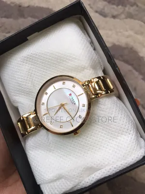 Curren 9051 Golden Stainless Steel Analog Watch for Women
