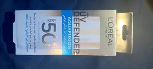 L 'Oreal. Paris. Uv Defender /Aquafusion