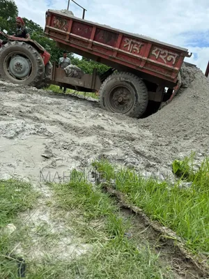 Ready and ongoing plots right next to the main Dhaka-Mawa road.