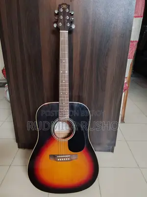 SK Acoustic Guitar – Sunburst – Good Condition
