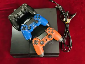 PS4 Slim With Fc22 Disk and 2 Original and One Copy Controller