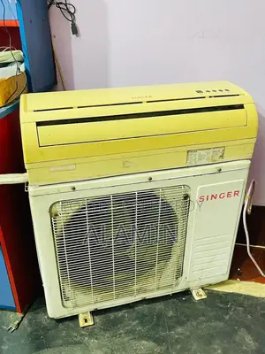 সিঙ্গার ১ টন এসি
