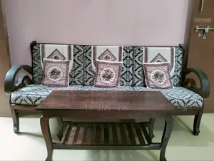 Sofa with tea table for sale.