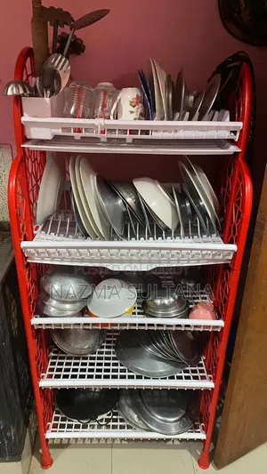 One kitchen rack and 10 curtains will be sold urgently.