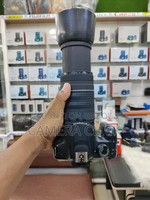ক্যানন ১২০০ডি ৭৫-৩০০মিমি টেলিফটো লেন্স