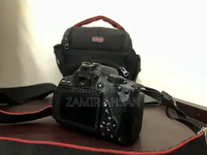 Canon EOS 700D (Body + Lens)