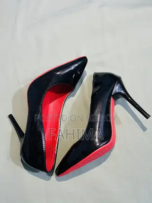Black Patent Leather Stiletto Pumps With Red Lining