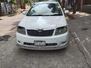 টয়োটা এক্সিও ২০০৯ সাদা