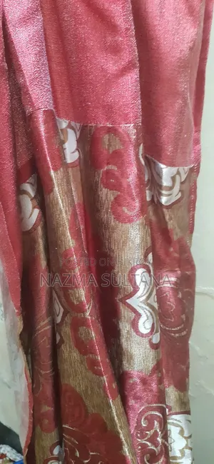 One kitchen rack and 10 curtains will be sold urgently.