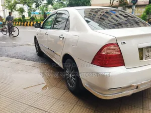টয়োটা করোল্লা ২০০৪ সাদা