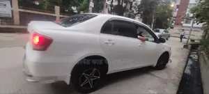 টয়োটা এক্সিও ২০০৮ সাদা