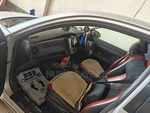 টয়োটা অ্যাক্সিও ২০১৫ সিলভার