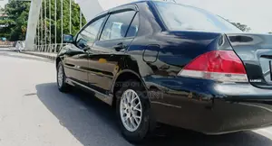মিতসুবিশি ল্যান্সার ২০১১ ব্ল্যাক