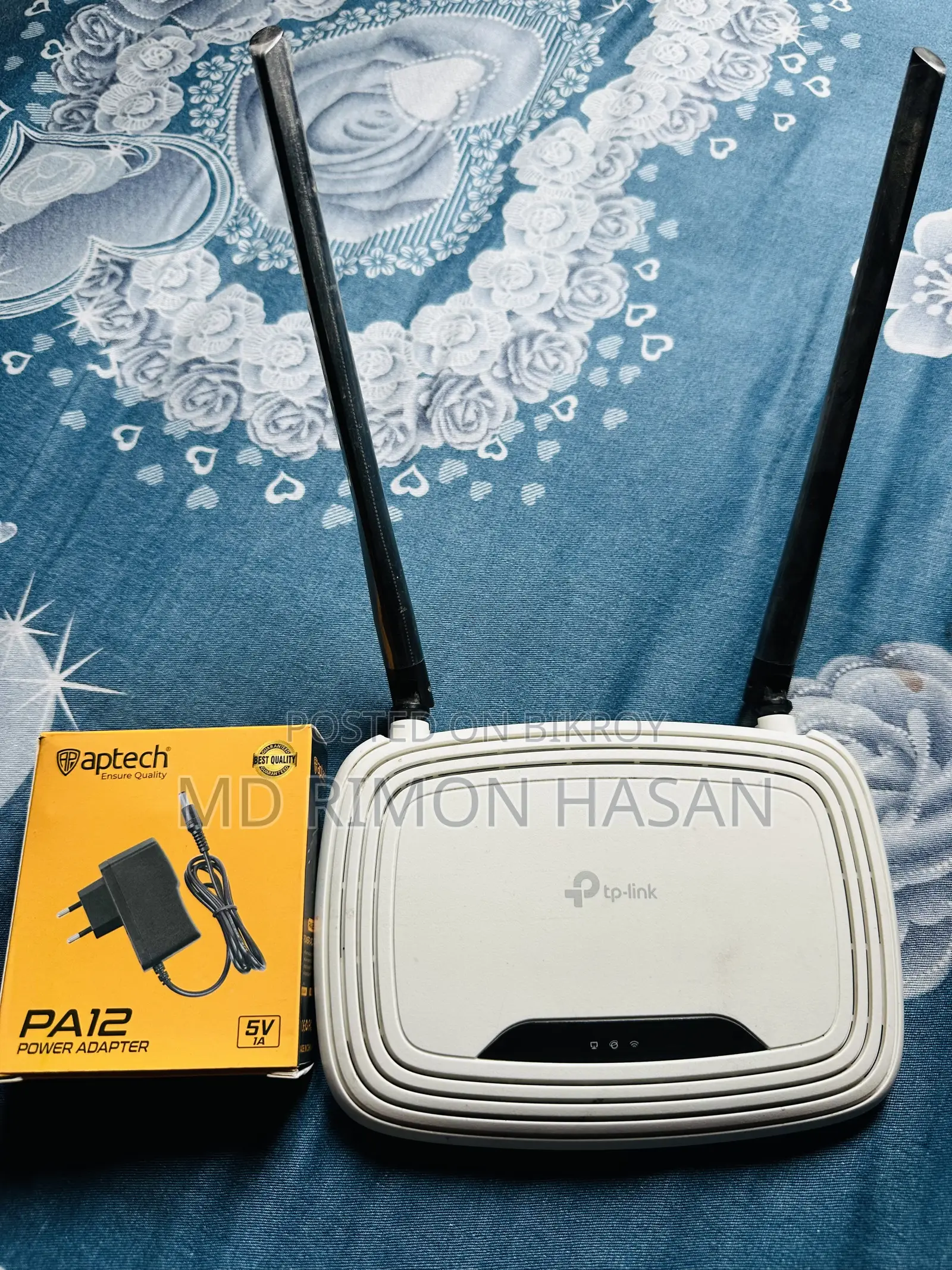Tp Link Router and ONU Charger.