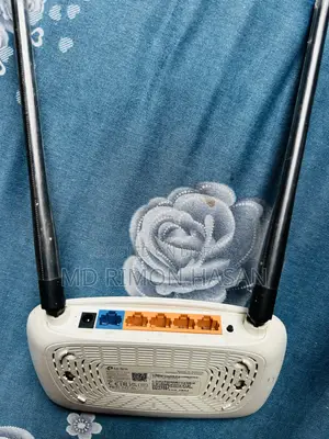 Tp Link Router and ONU Charger.