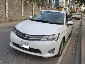 টয়োটা এক্সিও ২০১৫ সাদা