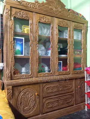 চারপাট ওয়ালা একটি শোকেস বিক্রি হবে অরজিনাল আকাশমনি খাট দিয়ে বানানো