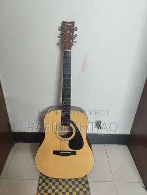 Yamaha F310 Acoustic Guitar + Ukulele + Heavy Padded Bag Combo