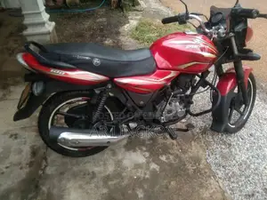 বাজাজ ডিসকভার ১০০ ২০১২ লাল