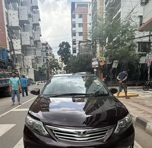 নতুন টয়োটা অ্যালিওন ২০১৫ বারগেন্ডি