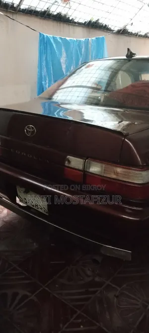 টয়োটা করোল্লা ১৯৯৪ মেরুন