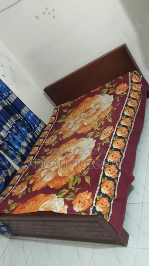 সুন্দর ডিজাইনের প্রসেসড উড ডাবল খাট (Good Condition)