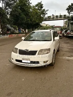 টয়োটা করোল্লা ফিল্ডার ২০০৪ সাদা