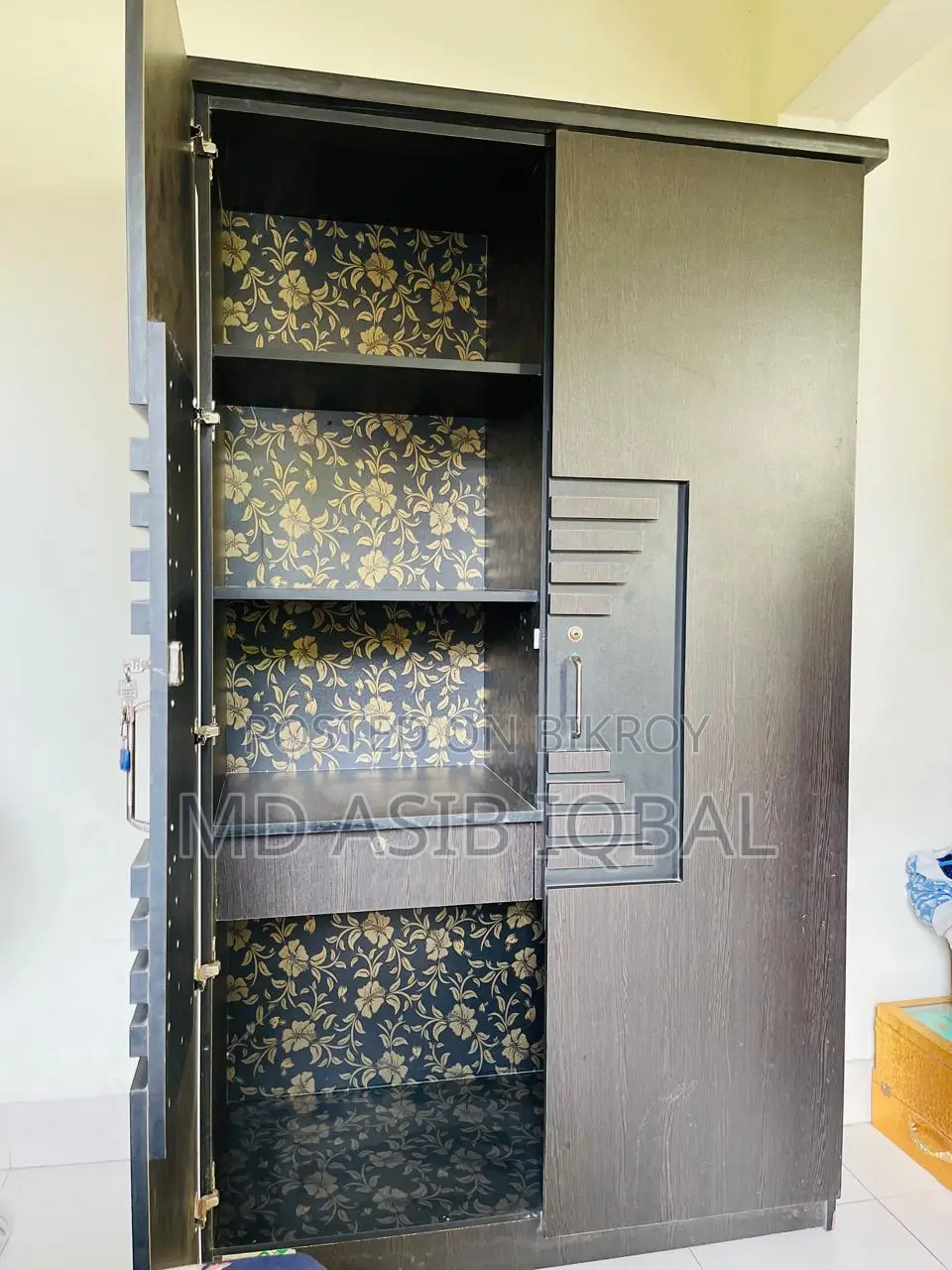 Two-door wardrobe made of Malaysian board for sale.