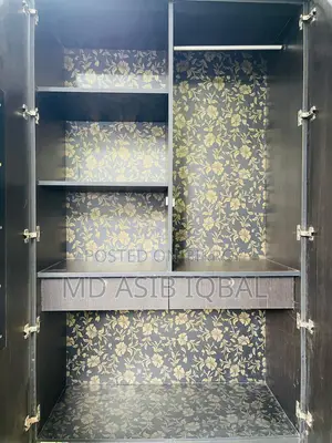 Two-door wardrobe made of Malaysian board for sale.