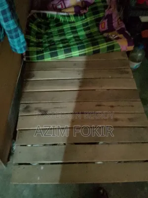 A single wooden bed frame and a single mattress will be sold in Basabo Nandipara