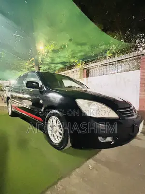 মিতসুবিশি ল্যান্সার ২০১২ ব্ল্যাক
