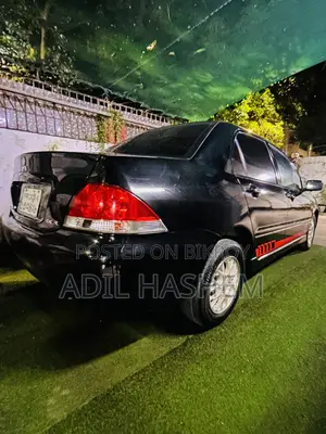 মিতসুবিশি ল্যান্সার ২০১২ ব্ল্যাক