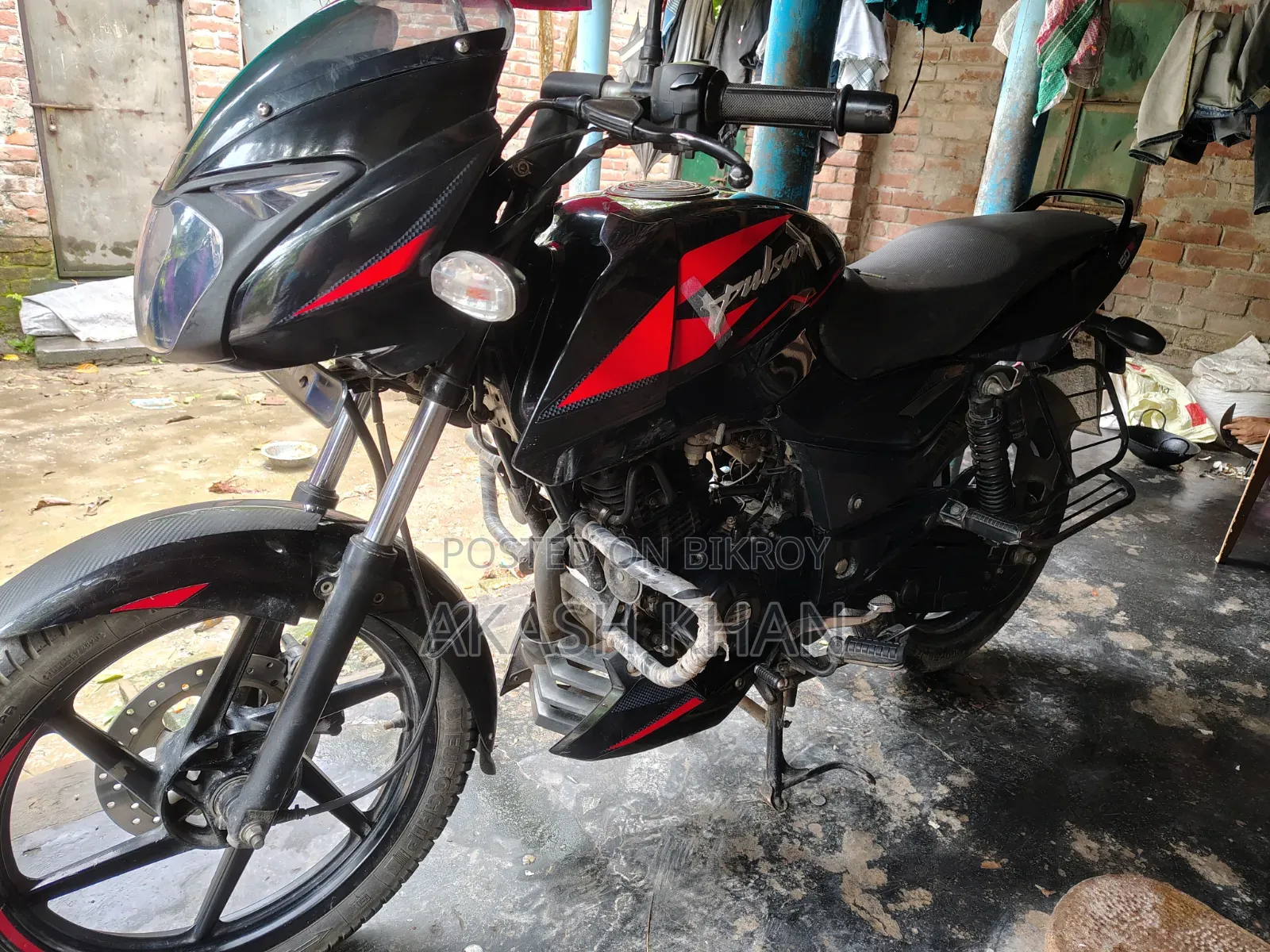 নতুন বাজাজ পালসার ১৫০ ২০২২ লাল
