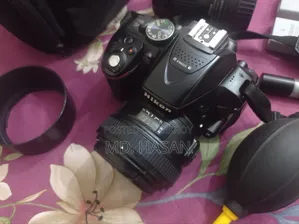 Nikon D5200 ক্যামেরা + YN 50mm F1.8 প্রাইম লেন্স + AF-S DX 18-55mm লেন্স