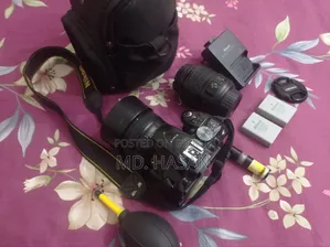 নিকন ডি৫২০০ ক্যামেরা + ওয়াইএন ৫০মিমি এফ১.৮ প্রাইম লেন্স + এএফ-এস ডিএক্স ১৮-৫৫মিমি লেন্স