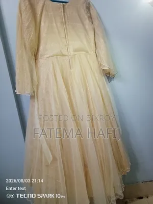 গোল্ডেন ফ্লোর লেংথ গাউন