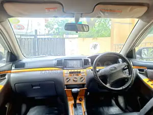 টয়োটা করোল্লা ২০০৪ সিলভার