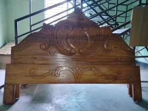 সুন্দর ডিজাইনের শক্ত আকাশমনি কাঠের খাট (৬ ফুট X ৭ ফুট)